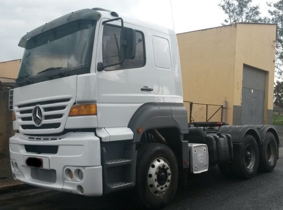 F028FE - TAPA SOL MB 1938S AXOR CARGO GII CAB BAIXA ACRILICO